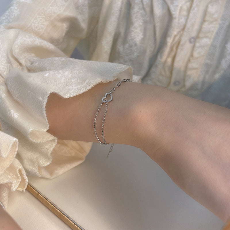 Damen zartes Armband mit verschnörkeltem Herzdesign Shop Nory