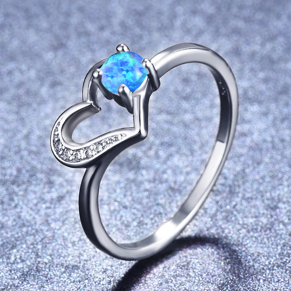 Damen Ring mit herzförmigem Design und funkelndem Opal Shop Nory
