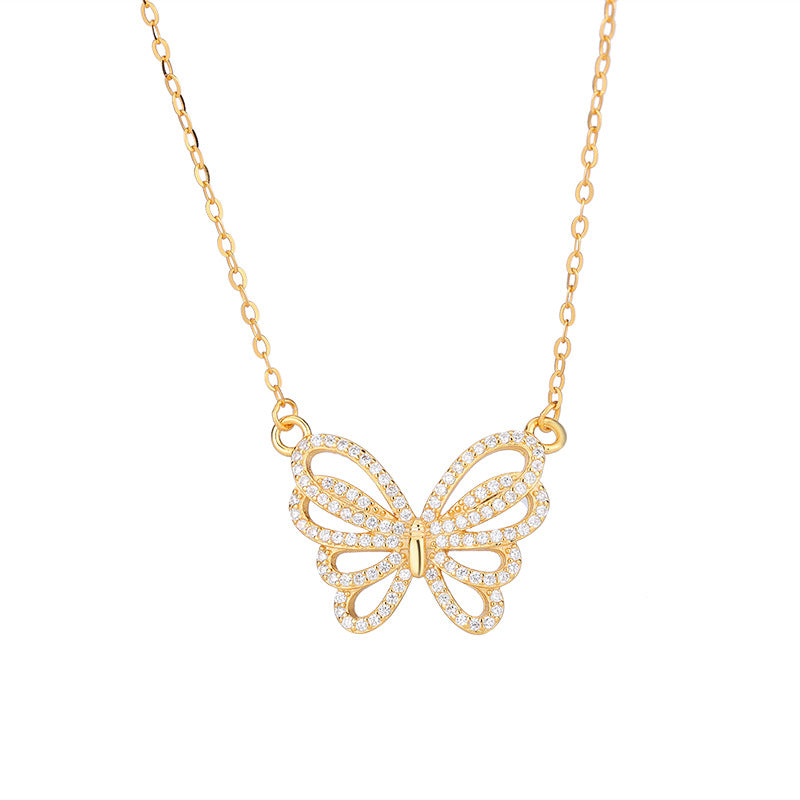 Damen Halskette mit filigranem Schmetterlingsanhänger und funkelnden Zirkonia Shop Nory
