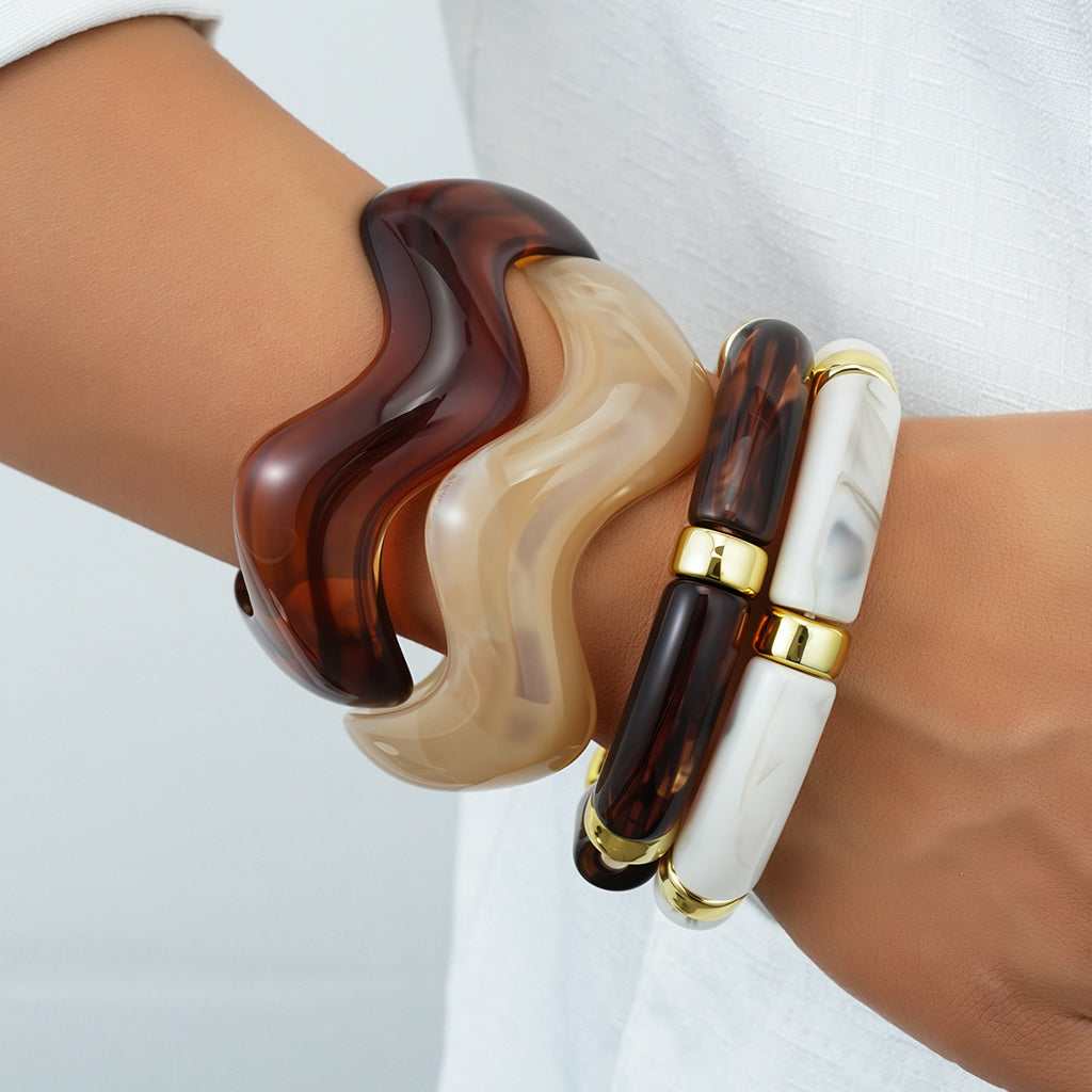 Damenarmreif mit geschwungenem Design und glänzender Oberfläche Shop Nory