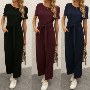 Damen Jumpsuit mit taillierbarem Bindegürtel und praktischen Taschen Shopnory