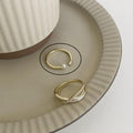 Damenring mit elegantem Wellenmuster und zeitlosem Design Shop Nory