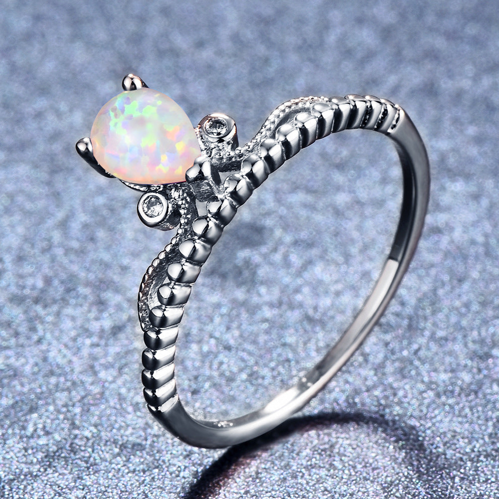 Damen Ring mit kunstvollem Opal und filigranem Design Shop Nory