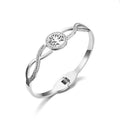 Damen Armreif mit elegantem Baumdesign und funkelnden Kristallakzenten Shop Nory