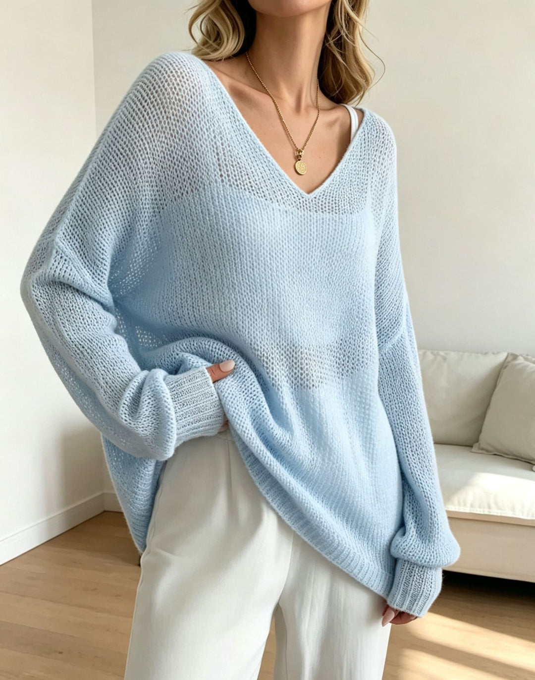 Damen Oversized Strickpullover mit tiefem V-Ausschnitt und feiner Lochstrickstruktur Shop Nory