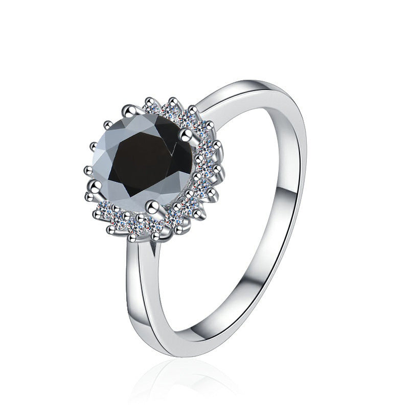 Damenring mit elegantem facettiertem Hauptstein und funkelndem Zirkonia-Besatz Shop Nory