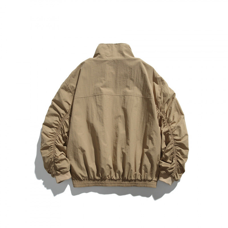 Unisex Leichte Nylon‑Bomberjacke mit Stehkragen, durchgehendem Reißverschluss und elastischem Saum Shop Nory