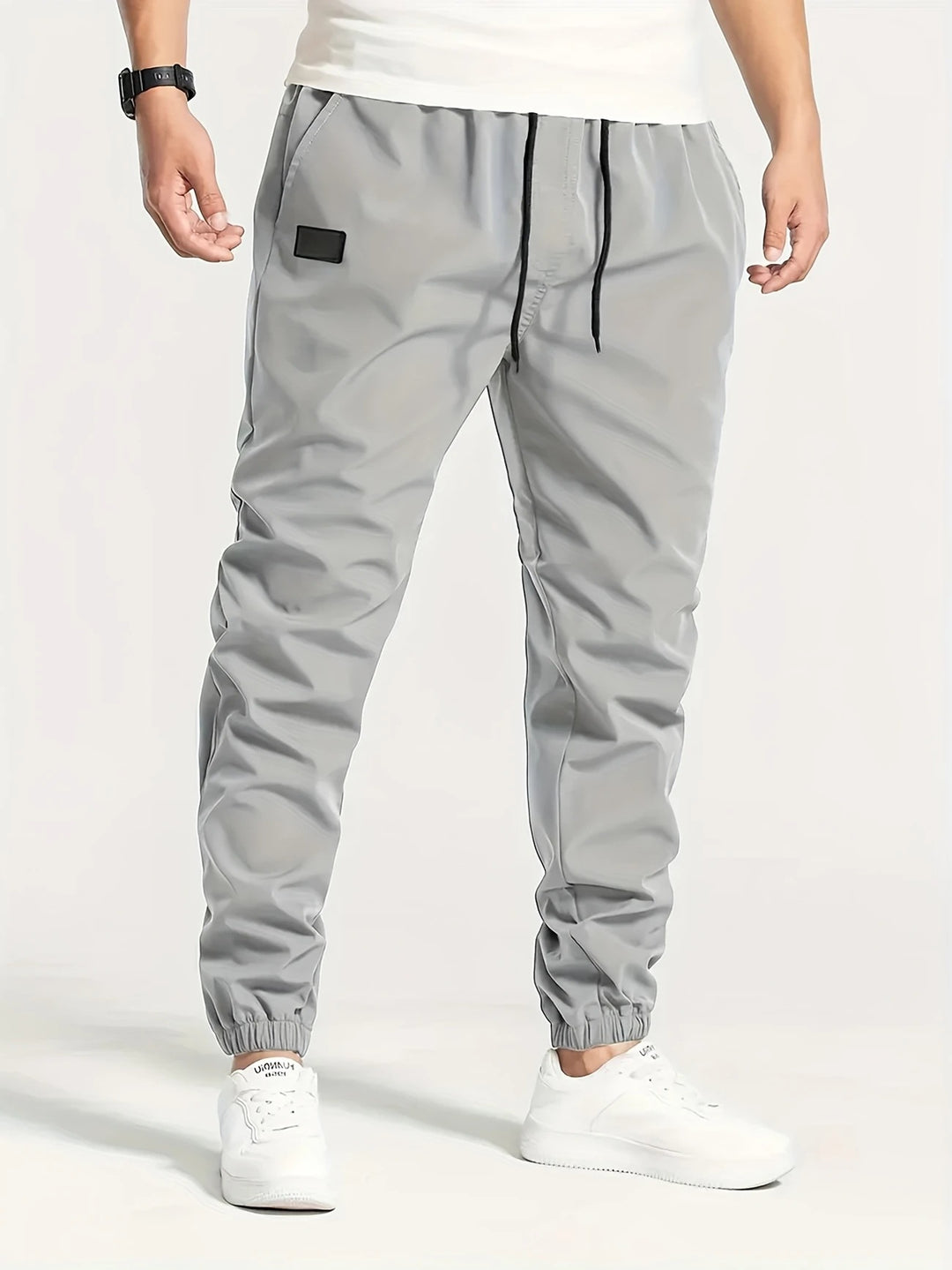 Herren Technische Jogginghose im Tapered‑Utility‑Stil mit elastischem Bund & Knöchelbündchen Shop Nory