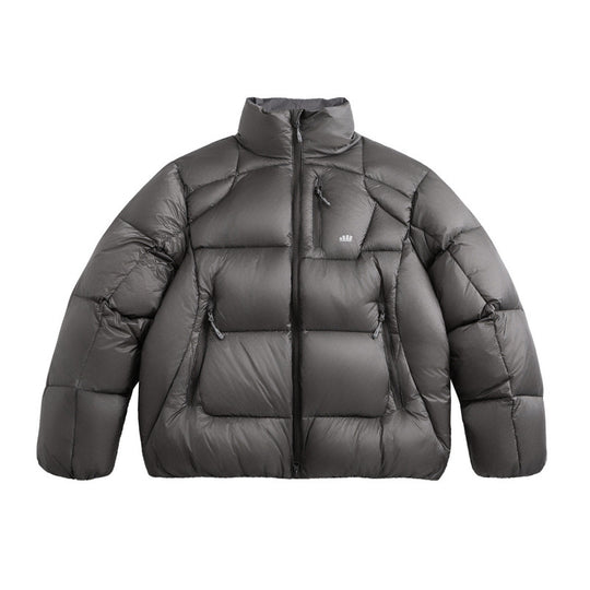 Unisex Kurz geschnittene gesteppte Daunenoptik-Jacke mit Stehkragen und Reißverschlusstaschen Shop Nory