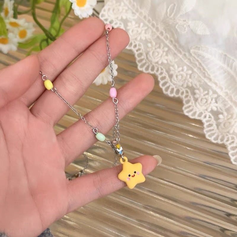 Damen Halskette mit verspieltem Sternenanhänger und bunten Perlen Shop Nory