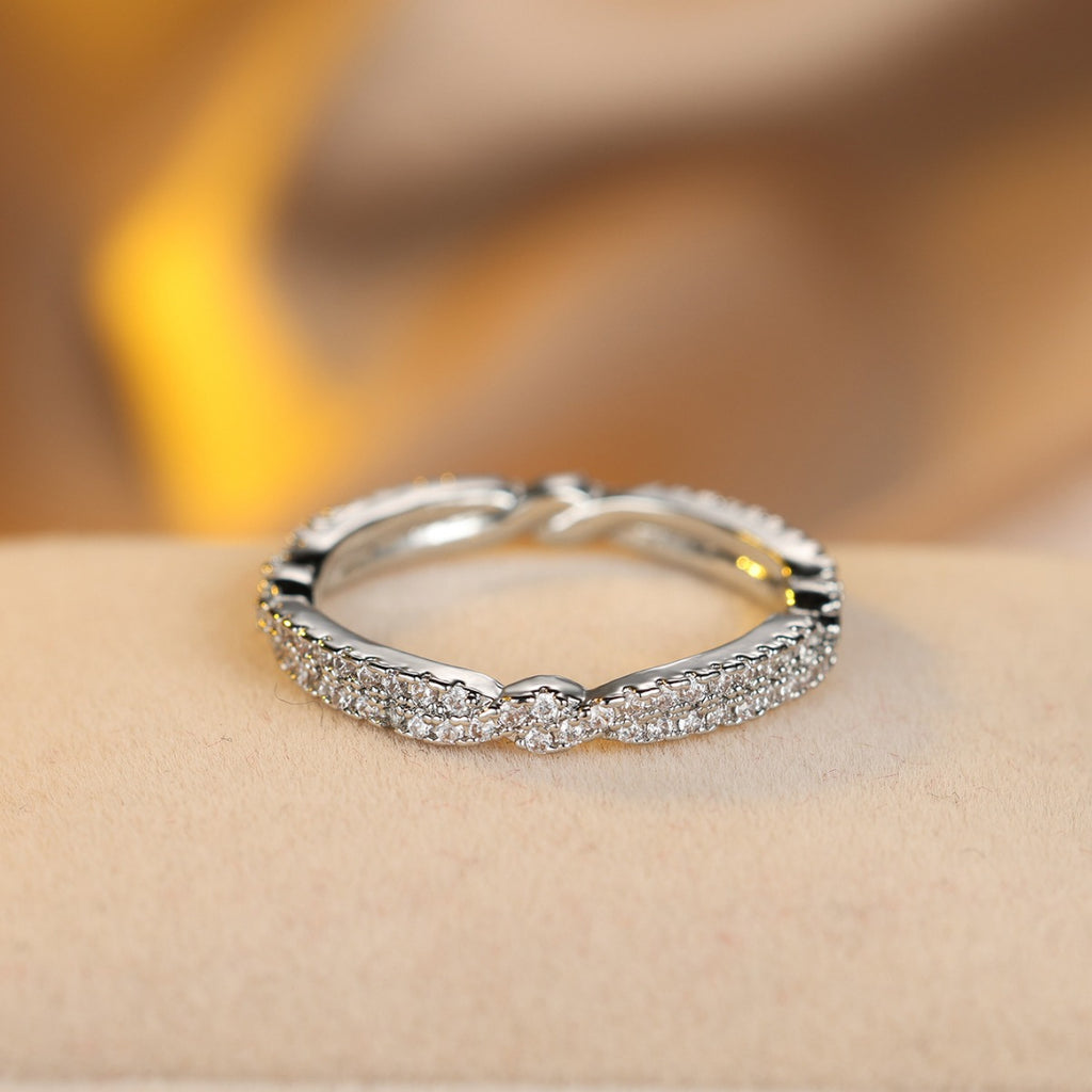 Damen Ring mit funkelnden Zirkonia und exquisitem Wellenmuster Shop Nory