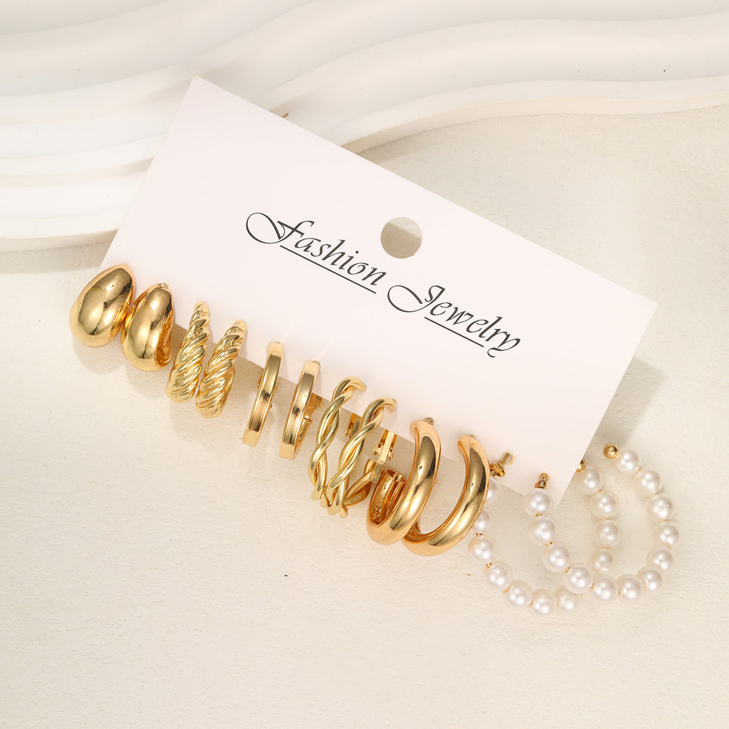 Damen Ohrstecker-Set mit eleganten Gold- und Perlenakzenten Shop Nory