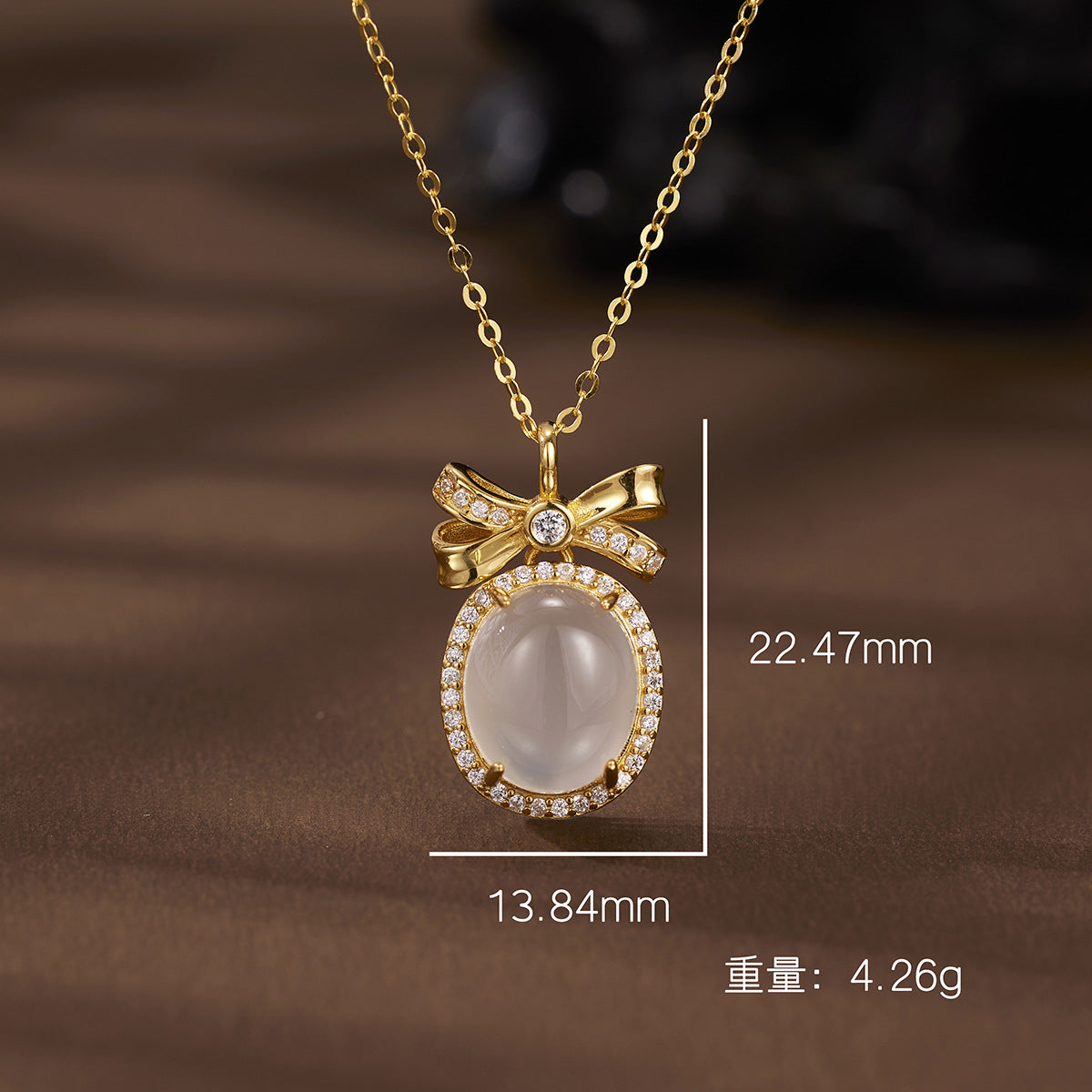 Damen Halskette mit einem filigranen Anhänger in Form einer Schleife und luxuriösen Zirkonia-Verzierungen Shop Nory