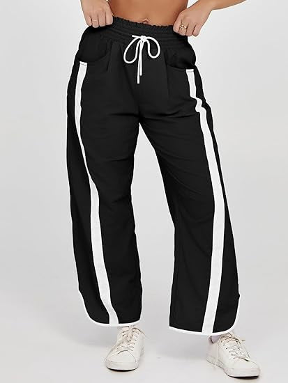 Damen nan relaxte Trackpants mit seitlichem Kontraststreifen, elastischem Smokbund und Eingrifftaschen Shop Nory