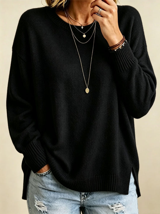 Damen Locker geschnittener Rundhals-Feinstrickpullover mit Seitenschlitzen und gerippten Bündchen Shop Nory