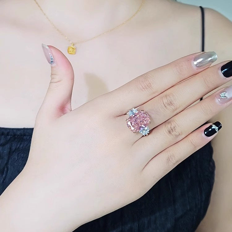 Damenring mit außergewöhnlichem pinken Edelstein und funkelnden Zirkonia Shop Nory