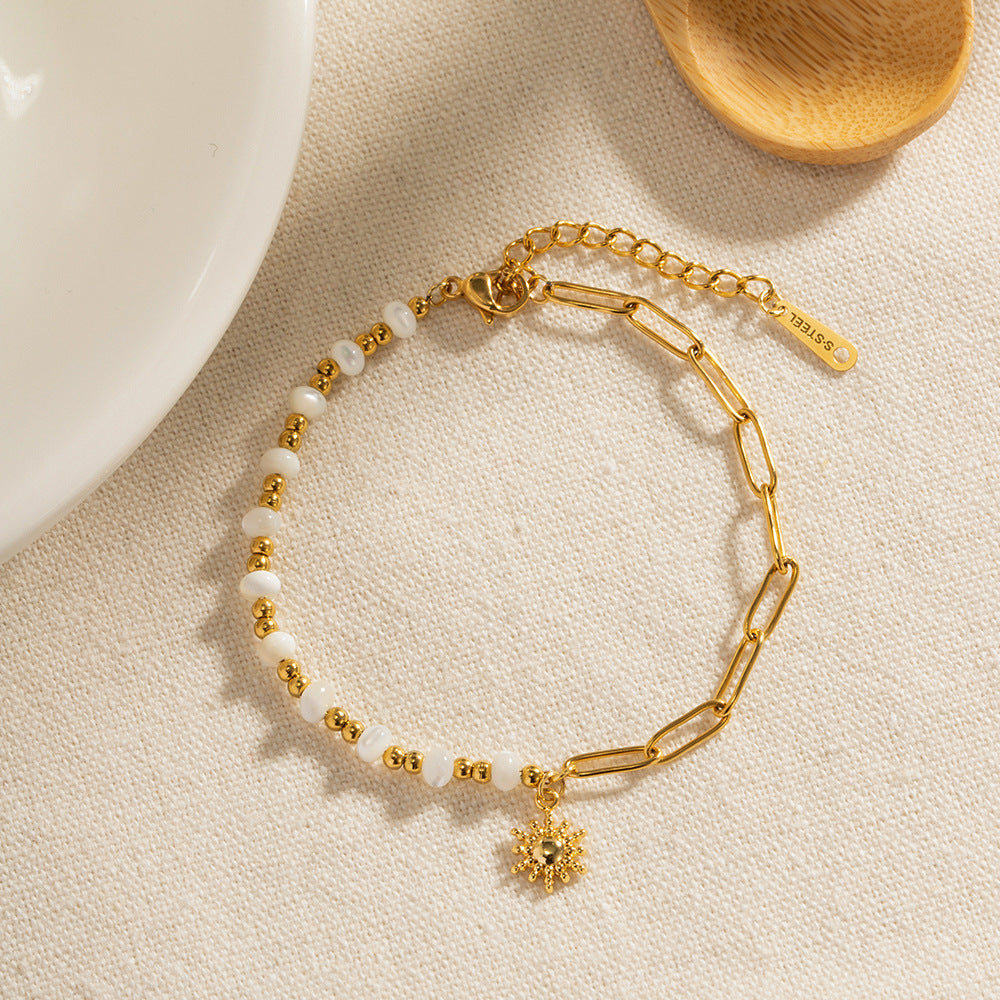 Damen Armband mit elegantem Perlen-Design und funkelndem Anhänger Shop Nory