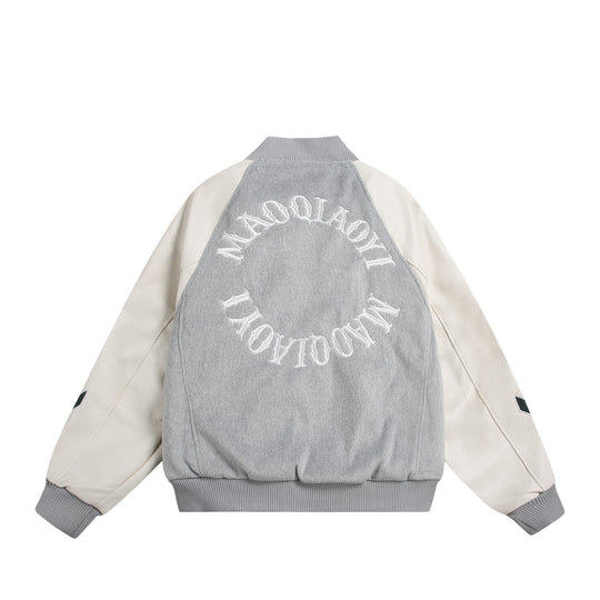 Unisex Varsity-Bomberjacke im Materialmix mit Stick- und Applikationsdetails Shop Nory