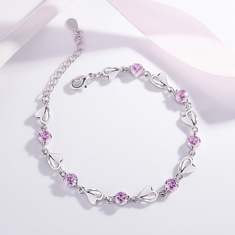 Damen Armband mit funkelnden Herz- und Zirkonia-Elementen Shop Nory