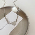 Damen Halskette mit Herzanhänger und modernem Gliederdesign Shop Nory