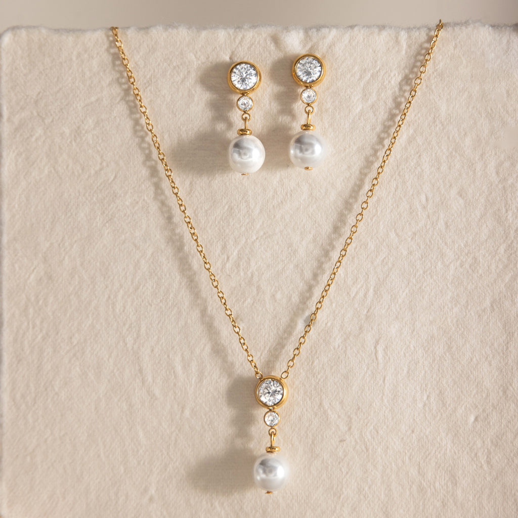 Damen Elegante Halskette mit Zirkonia und Perlenanhänger Shop Nory