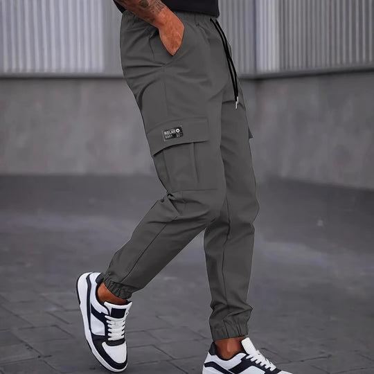 Herren Utility-Cargohose im Joggerstil mit Tunnelzugbund elastischen Beinabschlüssen und Multifachtaschen Shop Nory