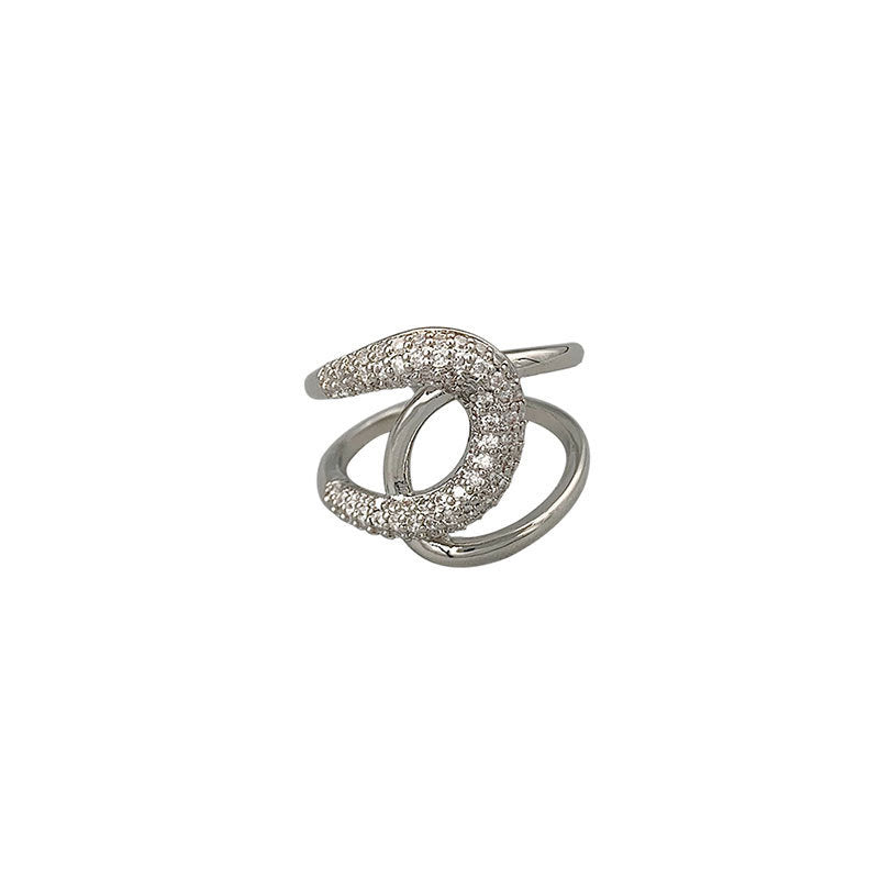 Damenring mit elegantem geschwungenen Design und funkelnden Zirkonia Shop Nory