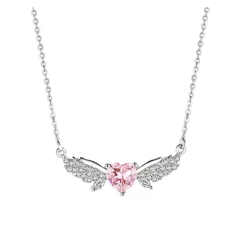 Damen Halskette mit filigranem Herzanhänger und zarten Flügelakzenten Shop Nory