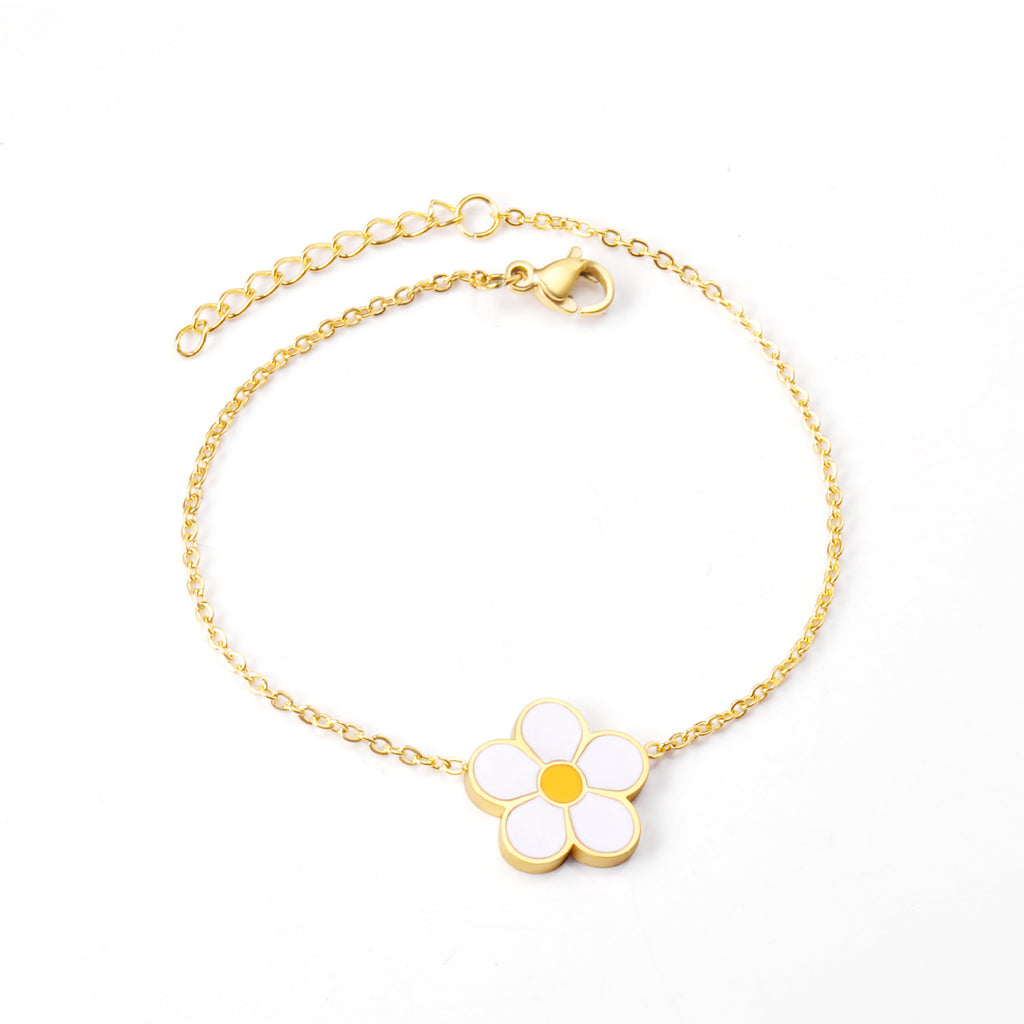 Damen Armband mit floralem Anhänger und funkelnden Akzenten Shop Nory
