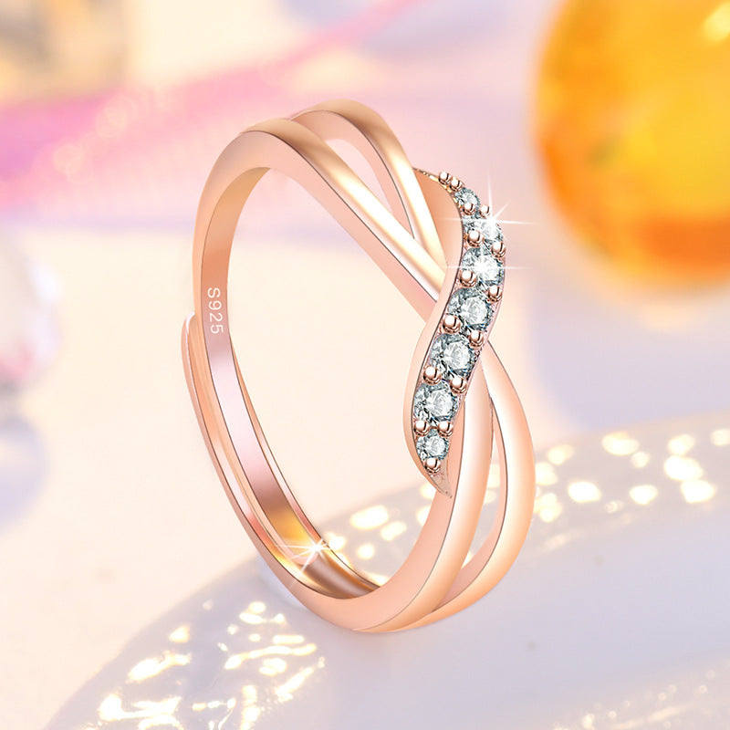 Damenring mit verspieltem Zirkonia-Besatz und elegantem Wellen-Design Shop Nory