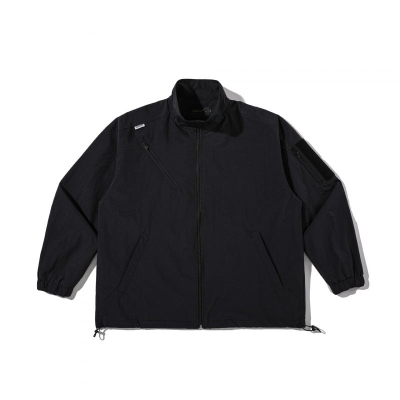 Unisex Leichte Technical-Utility Jacke mit Stehkragen, Reißverschlusstaschen und Kordelzugsaum Shop Nory