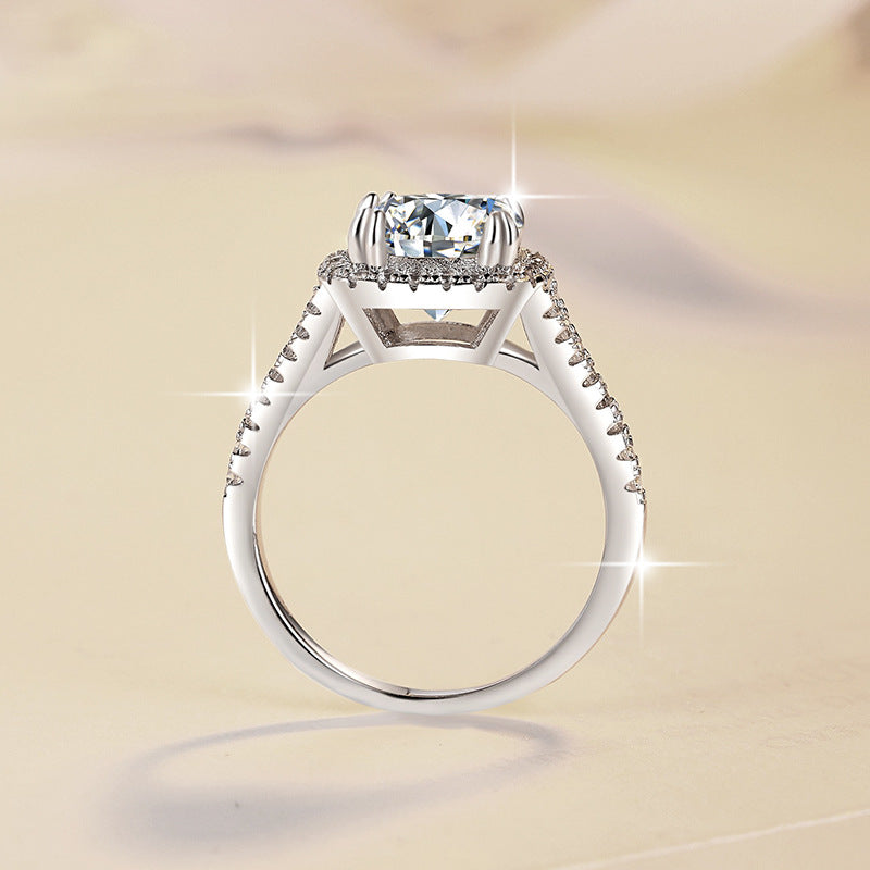 Damen Verlobungsring mit elegantem facettiertem Hauptstein und funkelndem Zirkonia-Besatz Shop Nory