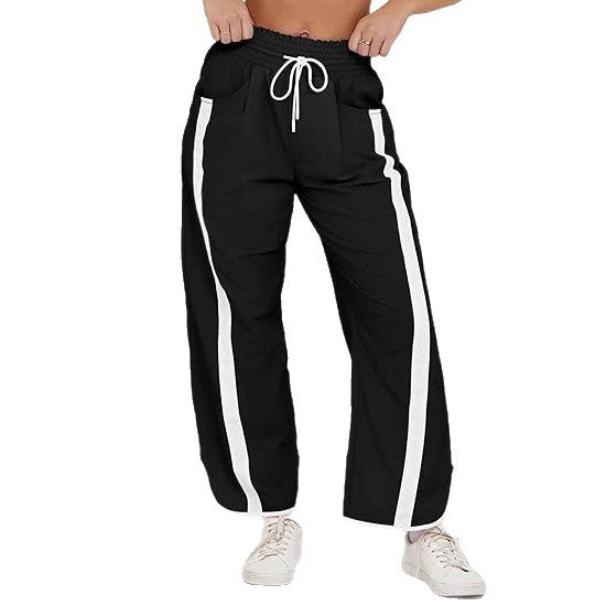 Damen nan relaxte Trackpants mit seitlichem Kontraststreifen, elastischem Smokbund und Eingrifftaschen Shop Nory
