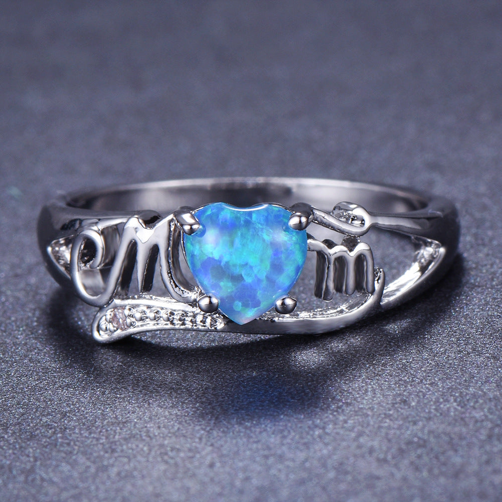 Damen Ring mit herzförmigem Opal und funkelnden Zirkonia-Steinen Shop Nory