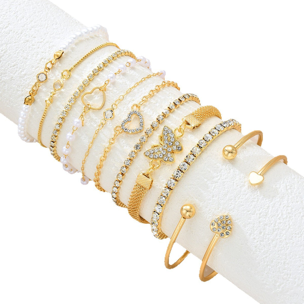 Damen Armband-Set mit funkelnden Kristallen und reizvollen Herzanhängern Shop Nory