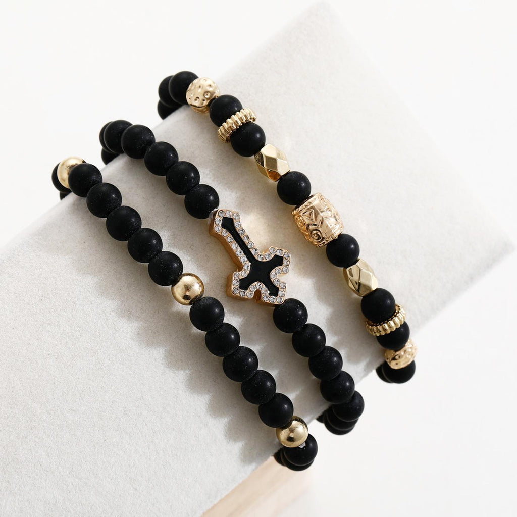 Damen Armreif-Set mit funkelndem Kreuzanhänger und einzigartigen Perlen Shop Nory