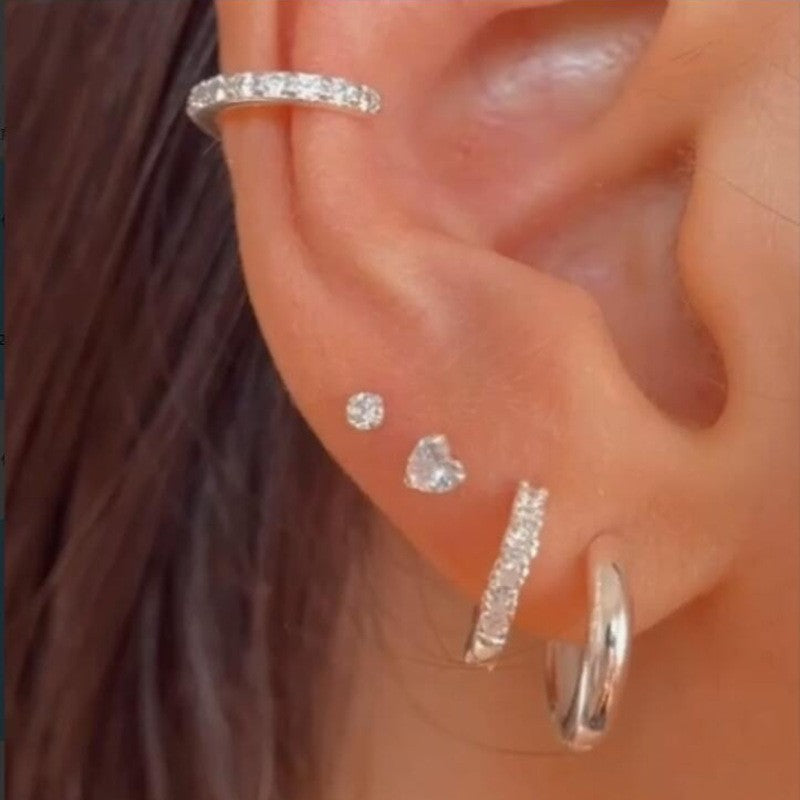 Damen Ohrstecker-Set mit eleganten Spiralen und funkelnden Akzenten Shop Nory
