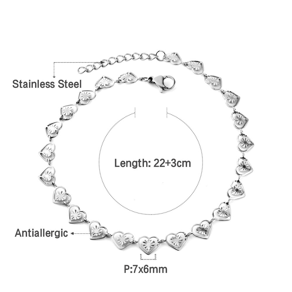 Damen Armband mit herzförmigen Gliederungen aus hochwertigem Edelstahl und goldplattierter Oberfläche Shop Nory