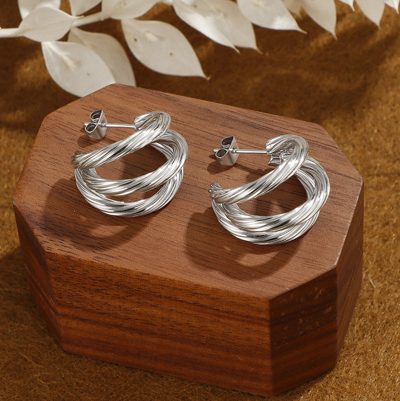 Damen elegante Ohrstecker im geschwungenen Design Shop Nory