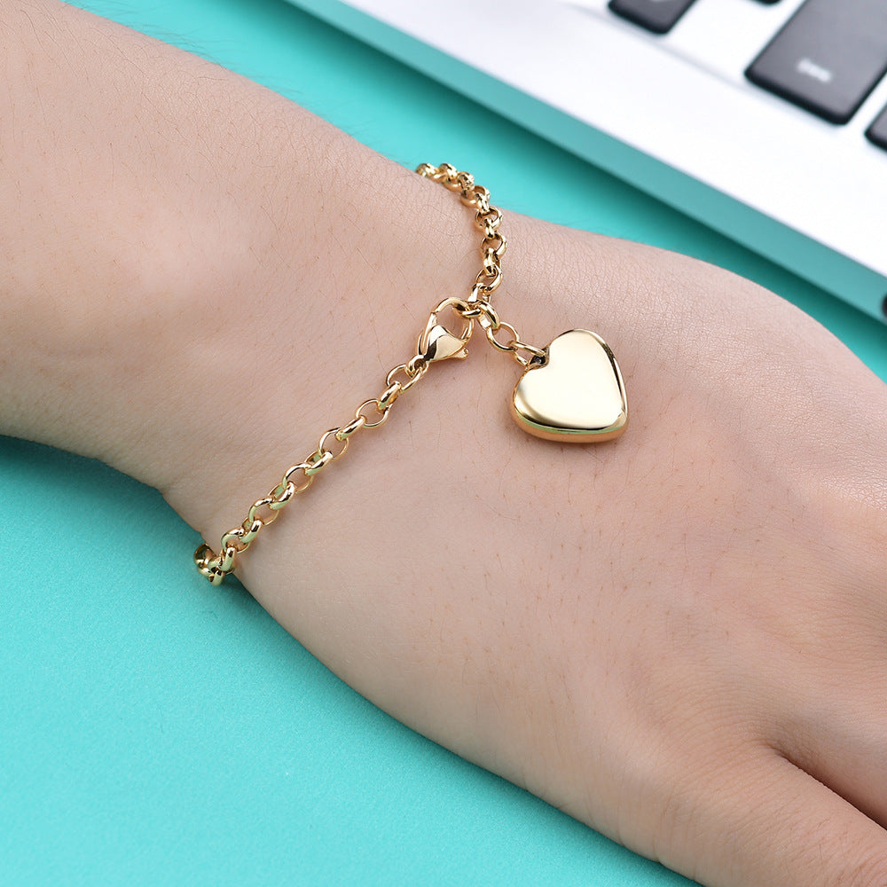 Damen Armband mit herzförmigem Charm aus hochwertigem Edelstahl Shop Nory