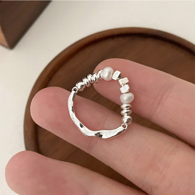 Damen Ring mit kunstvollem Design und edlen Perlenakzenten Shop Nory