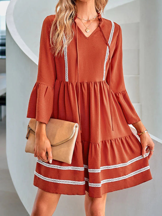 Damen Stufiges Tunika-Kleid mit V-Ausschnitt, Kordelzug und Glockenärmeln Shop Nory