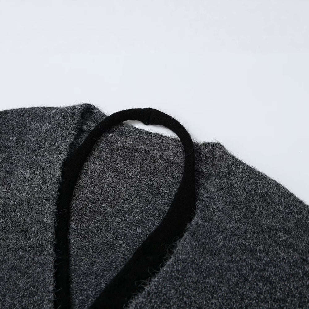 Damen Oversize Strickcardigan mit tiefem V Ausschnitt und Rippbund Shop Nory