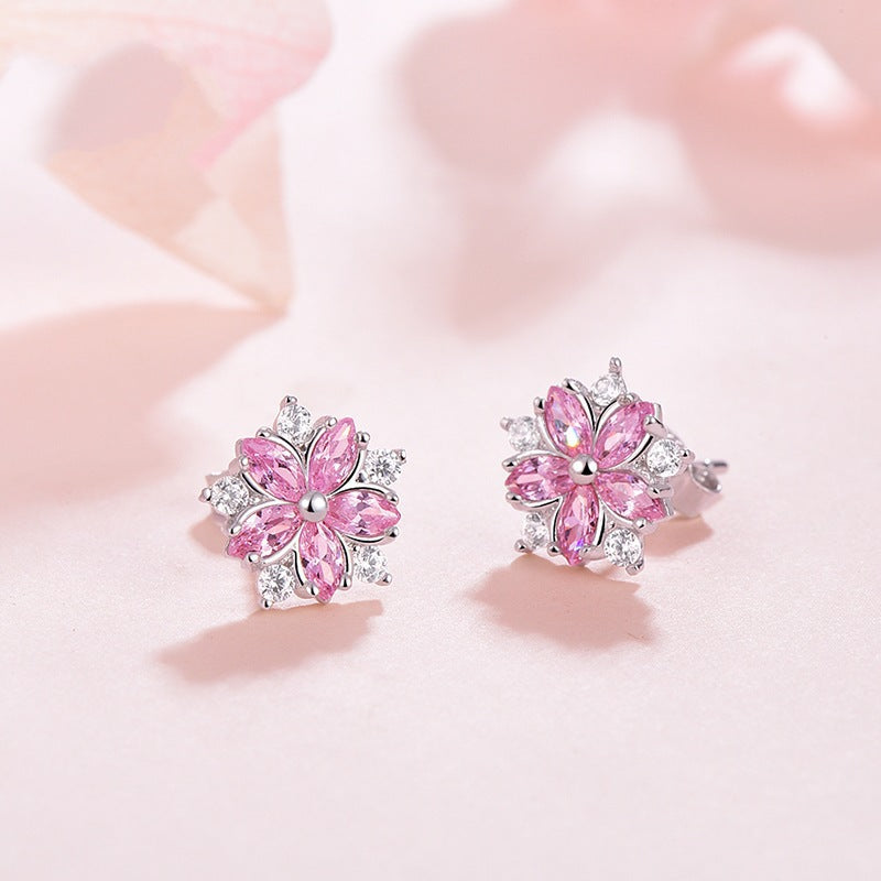 Damen Ohrringe im floralen Design mit funkelnden Zirkonia Shop Nory