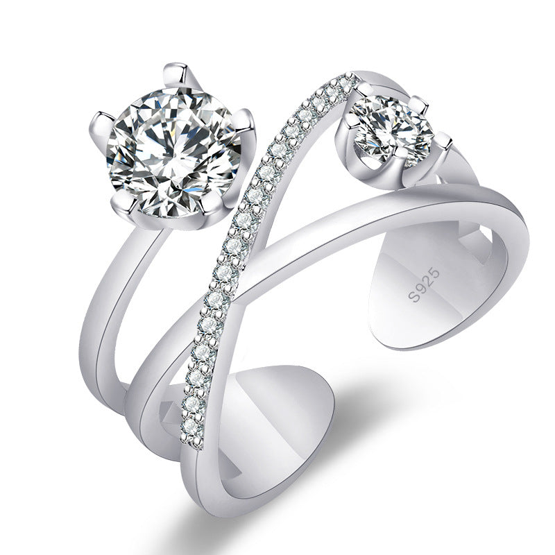 Damen Ring mit funkelnden Zirkonia und elegantem Kreuzdesign Shop Nory