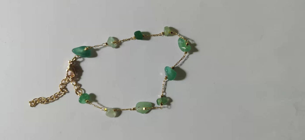 Damen Armband mit natürlichen Edelsteinen und goldfarbenen Akzenten Shop Nory