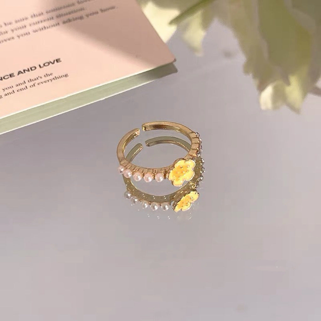 Damen Ring mit floralen Ziersteinen und funkelndem Design Shop Nory