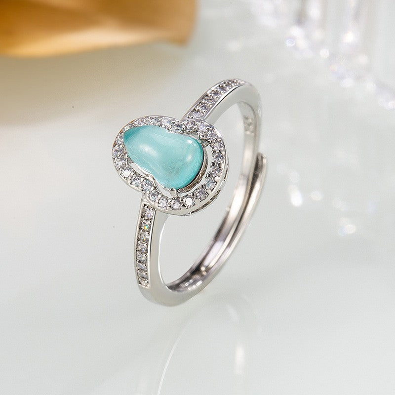 Damen Ring mit filigranem Tropfenmotiv und funkelnden Zirkonia Shop Nory