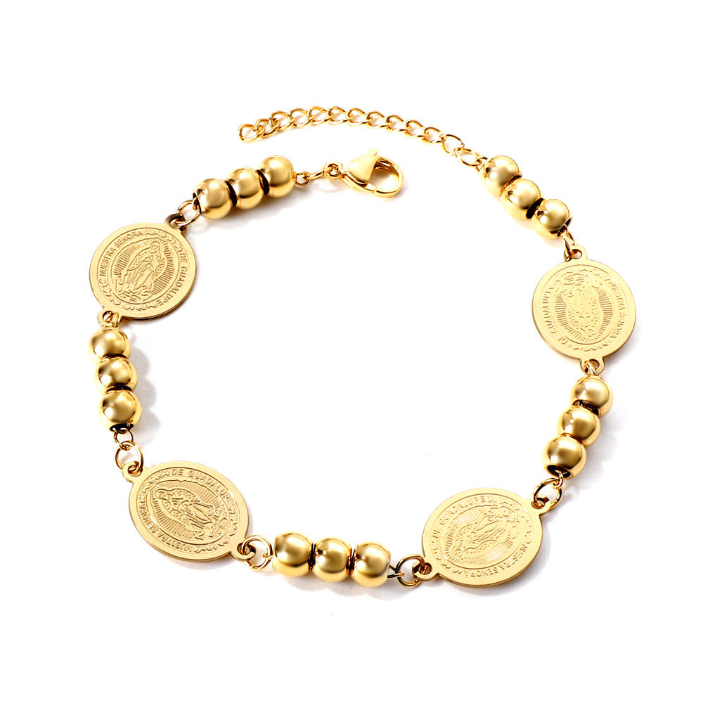 Damen Armband aus goldplattiertem Edelstahl mit Münz- und Perlenverzierungen Shop Nory