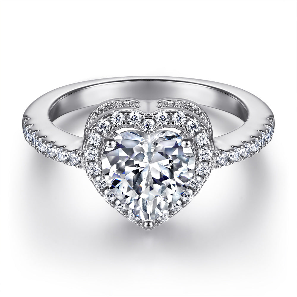 Damen Verlobungsring mit strahlendem Hauptstein und kunstvollem Zirkonia-Besatz Shop Nory
